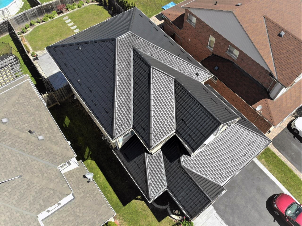 Aerial view of a completed metal roof