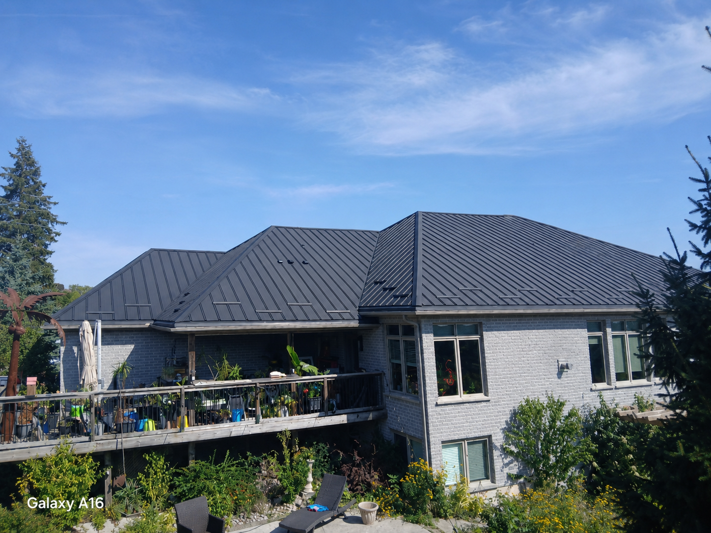Completed dark standing seam metal roof